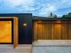 Sleek British garage door design combining minimalism and modern functionality