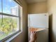 Kitchen refrigerator cooling system maintenance in Miami apartment