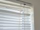 Fixing stuck window blind cord in Dallas home