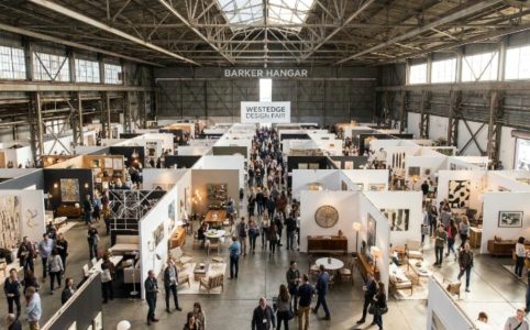 Aerial view of exhibitor booths and visitors at WestEdge Design Fair inside Barker Hangar, Santa Monica