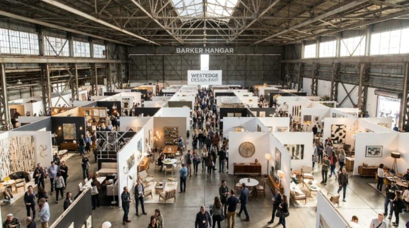 Aerial view of exhibitor booths and visitors at WestEdge Design Fair inside Barker Hangar, Santa Monica