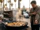 Clothes holding fried food odors in Los Angeles kitchen
