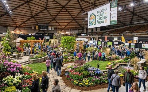 Visitors exploring colorful display gardens inside the Tacoma Dome at the Tacoma Home + Garden Show 2027